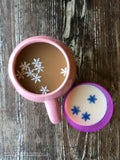 Edible Colored Snowflakes in coffee and milk Frozen